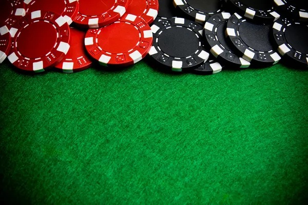 Live casino studio with multiple dealer tables and professional lighting